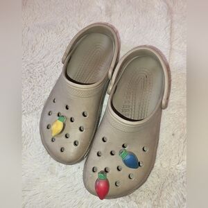CROCS Tan. Women's 8 or Men’s 6 With Bulb Charms